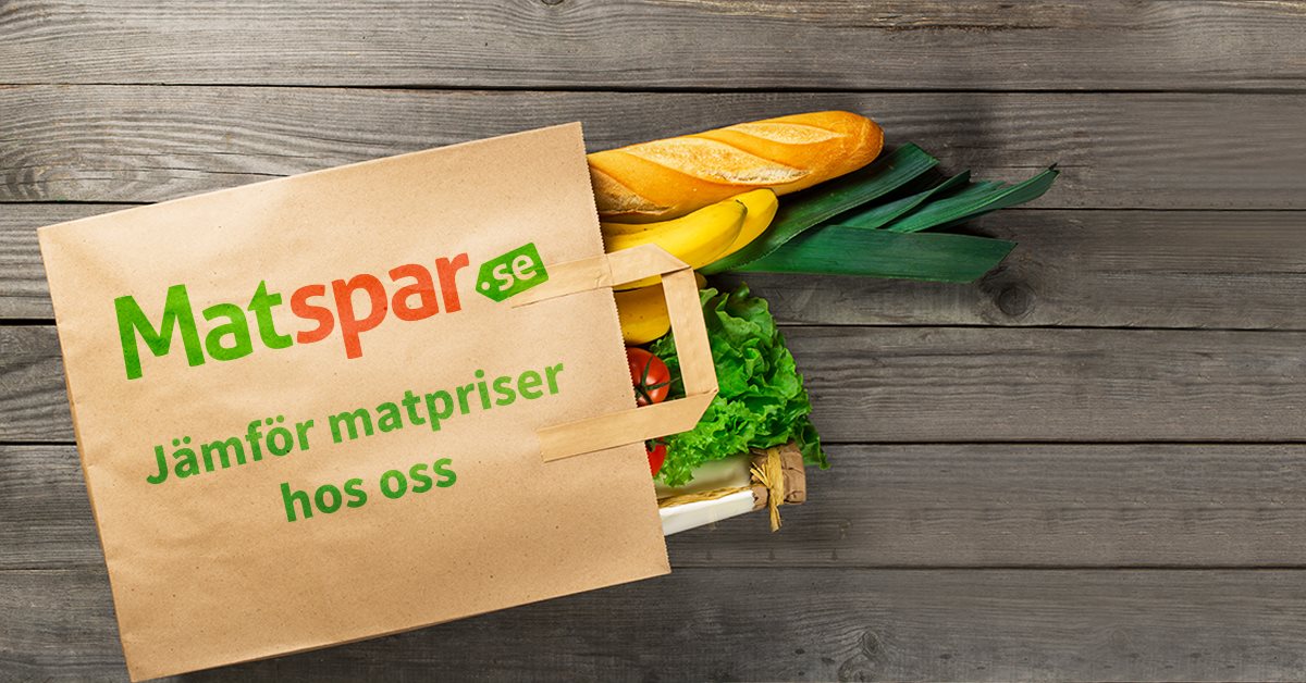 Liggande papperskasse där en baguette och grönsaker sticker ut