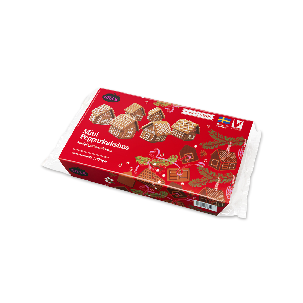 En förpackning pepparkakshus mot en vit bakgrund