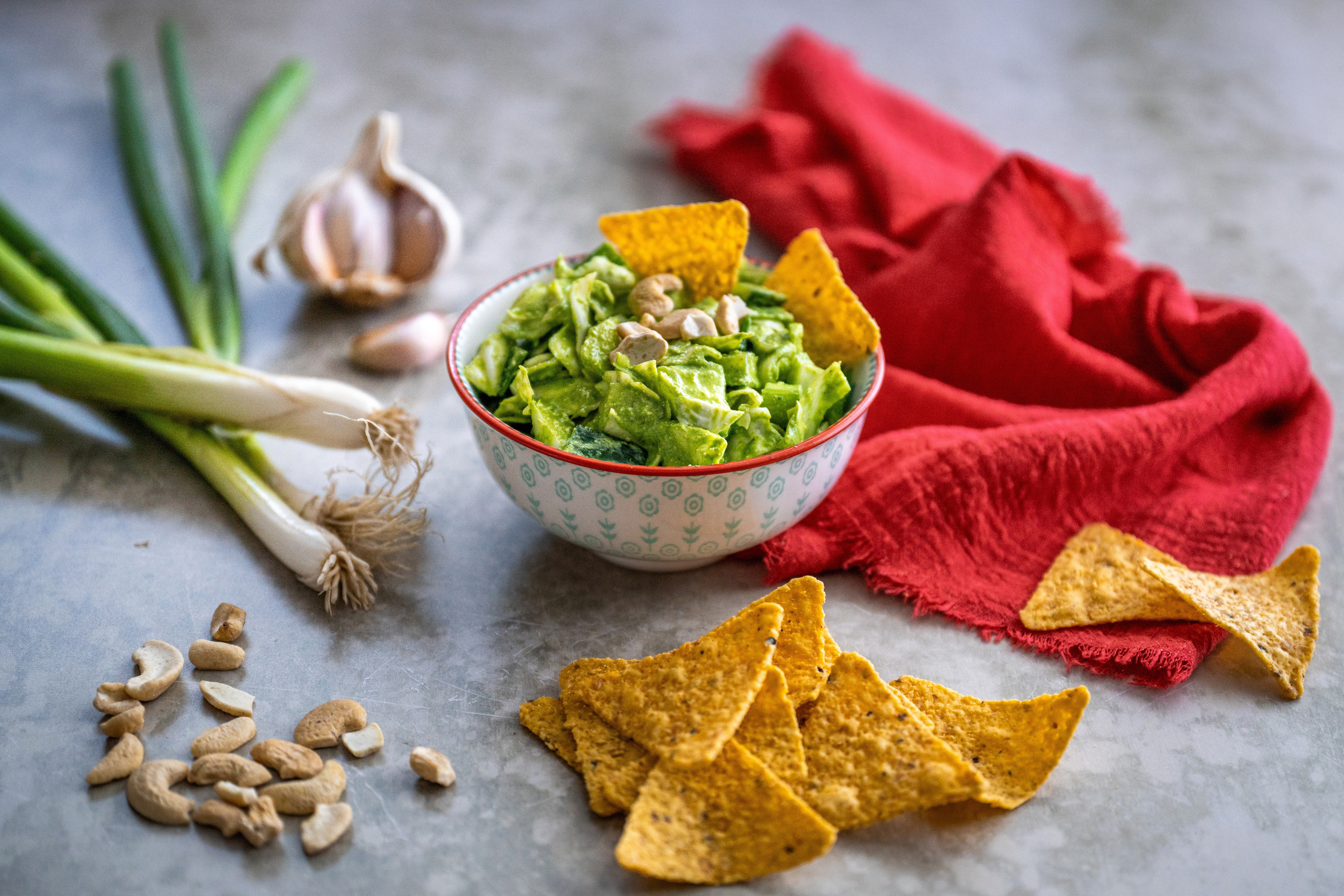 green goddess salad with dressing and nachos