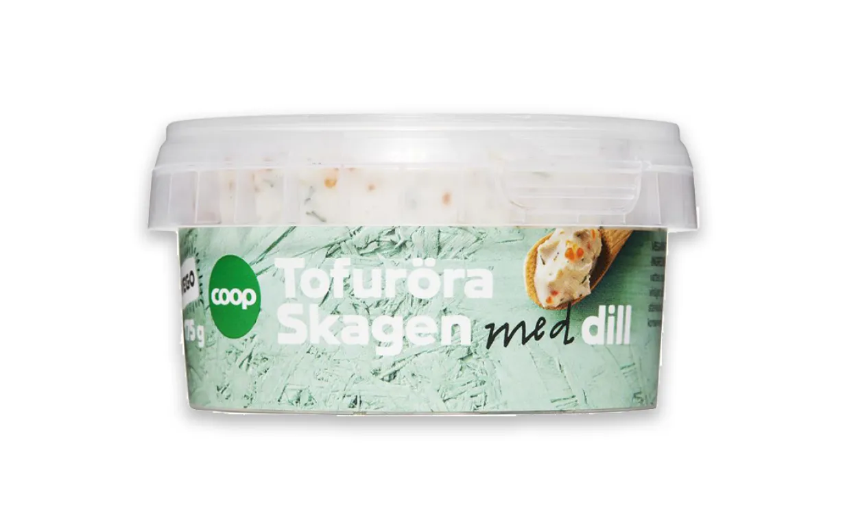 en burk med skagenröra mot en vitbakgrund