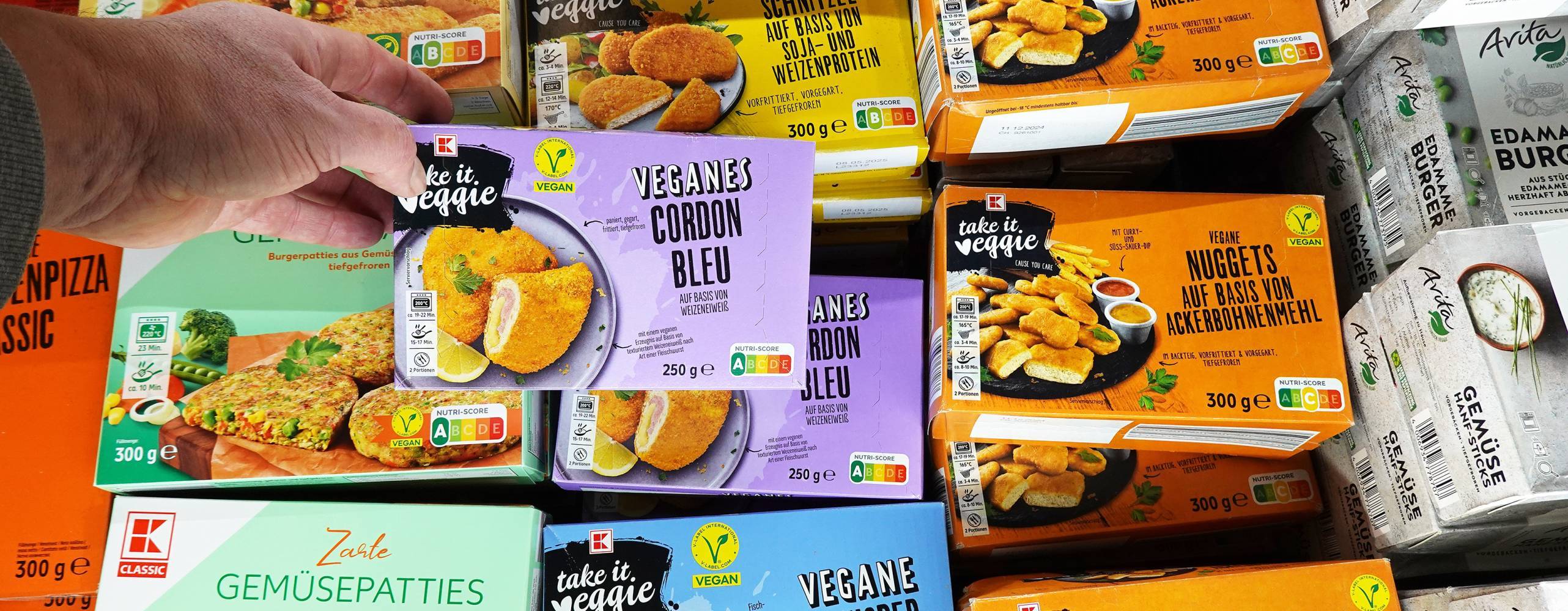 Freezer with packaged frozen pastries in a supermarket. Coppenrath &amp; Wiese is a German food company that is one of the largest frozen bakery products in Europe, own