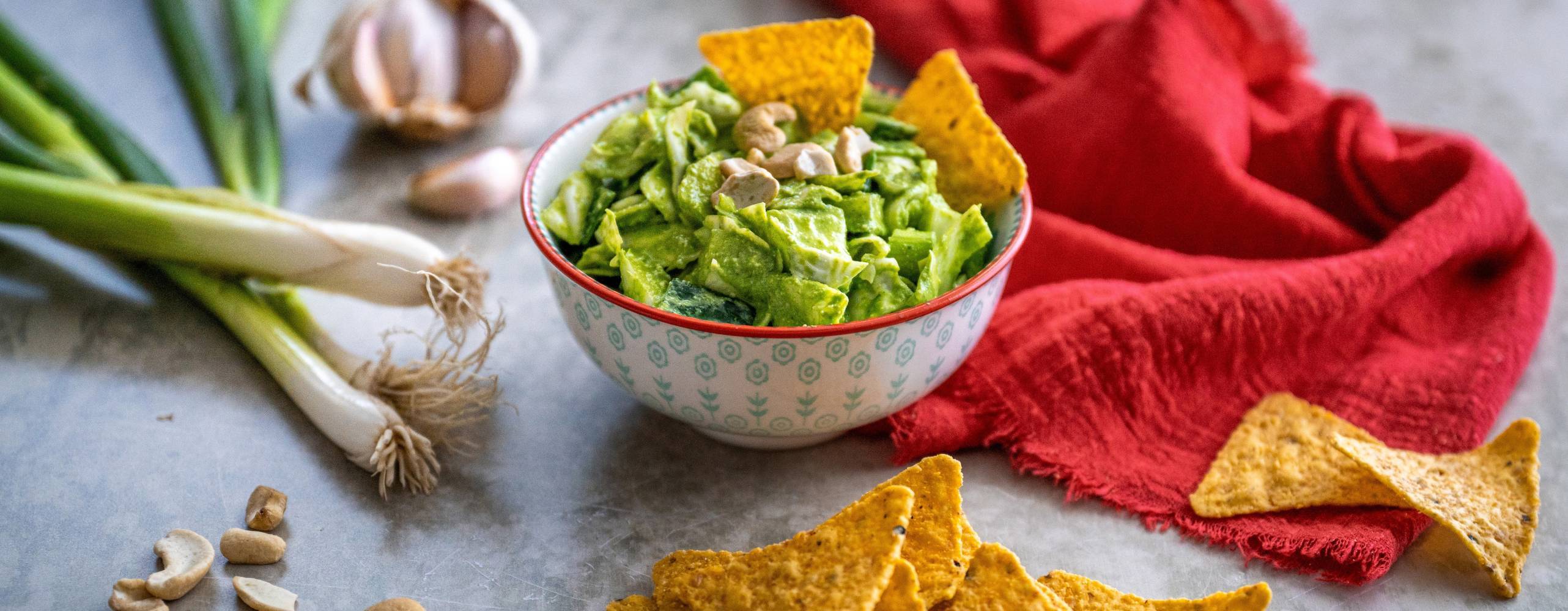 green goddess salad with dressing and nachos